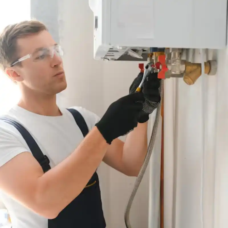 professional-plumber-checking-boiler-pipes-boiler-service-concept professional-plumber-checking-boiler-pipes-boiler-service-concept